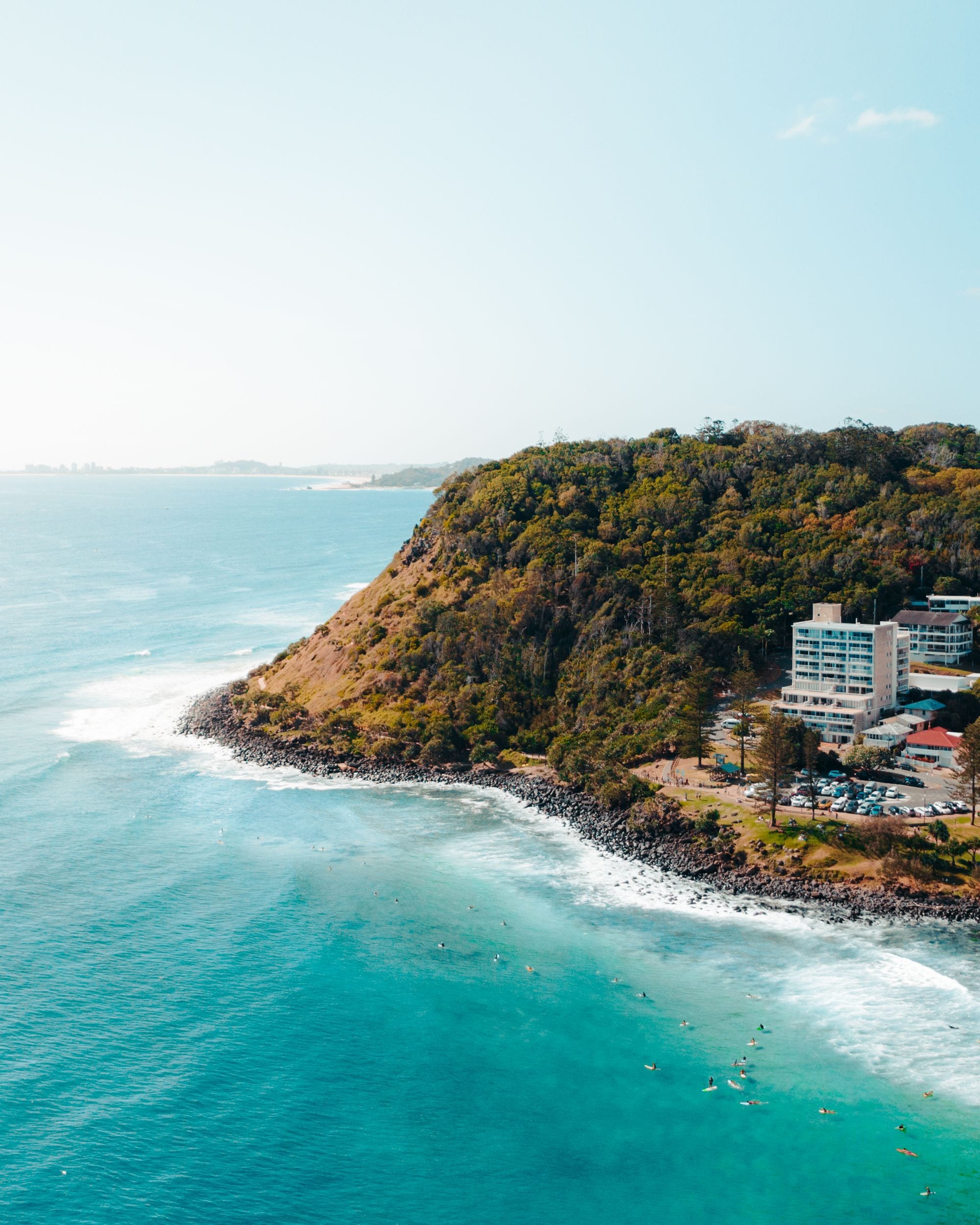 Green Burleigh Head National Park headland meeting turquoise surf on the Gold Coast