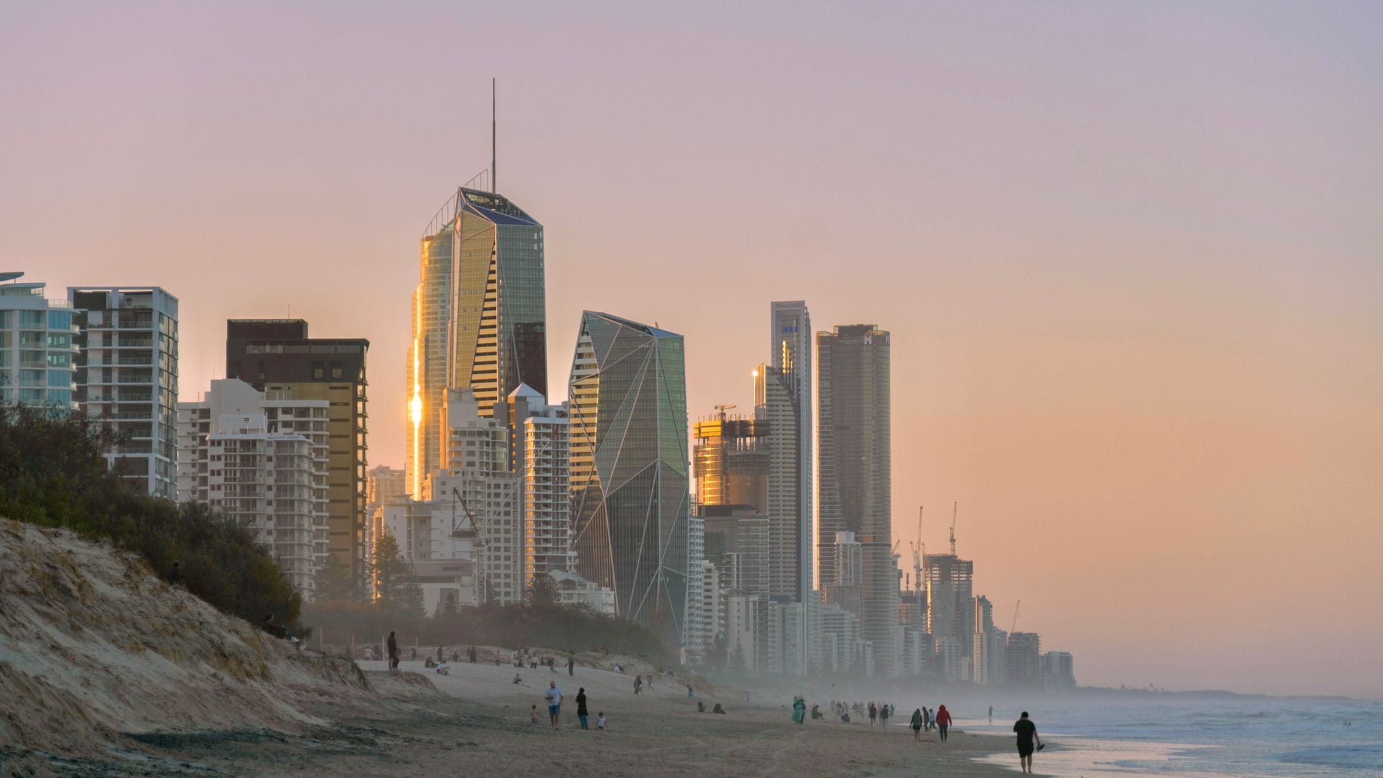 Surfers Paradise towers catching the last light above the beach at dusk on the Gold Coast