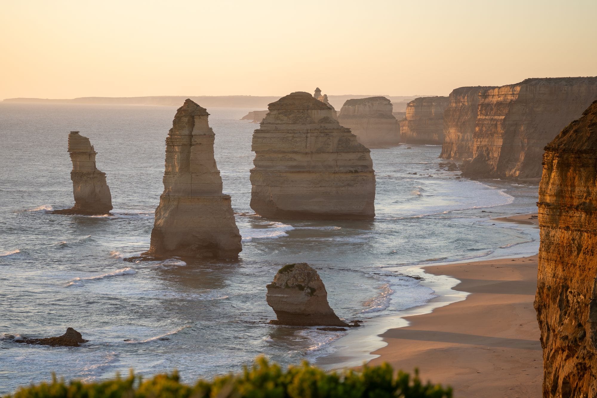 Limestone stacks of the Twelve Apostles at dusk along the Great Ocean Road