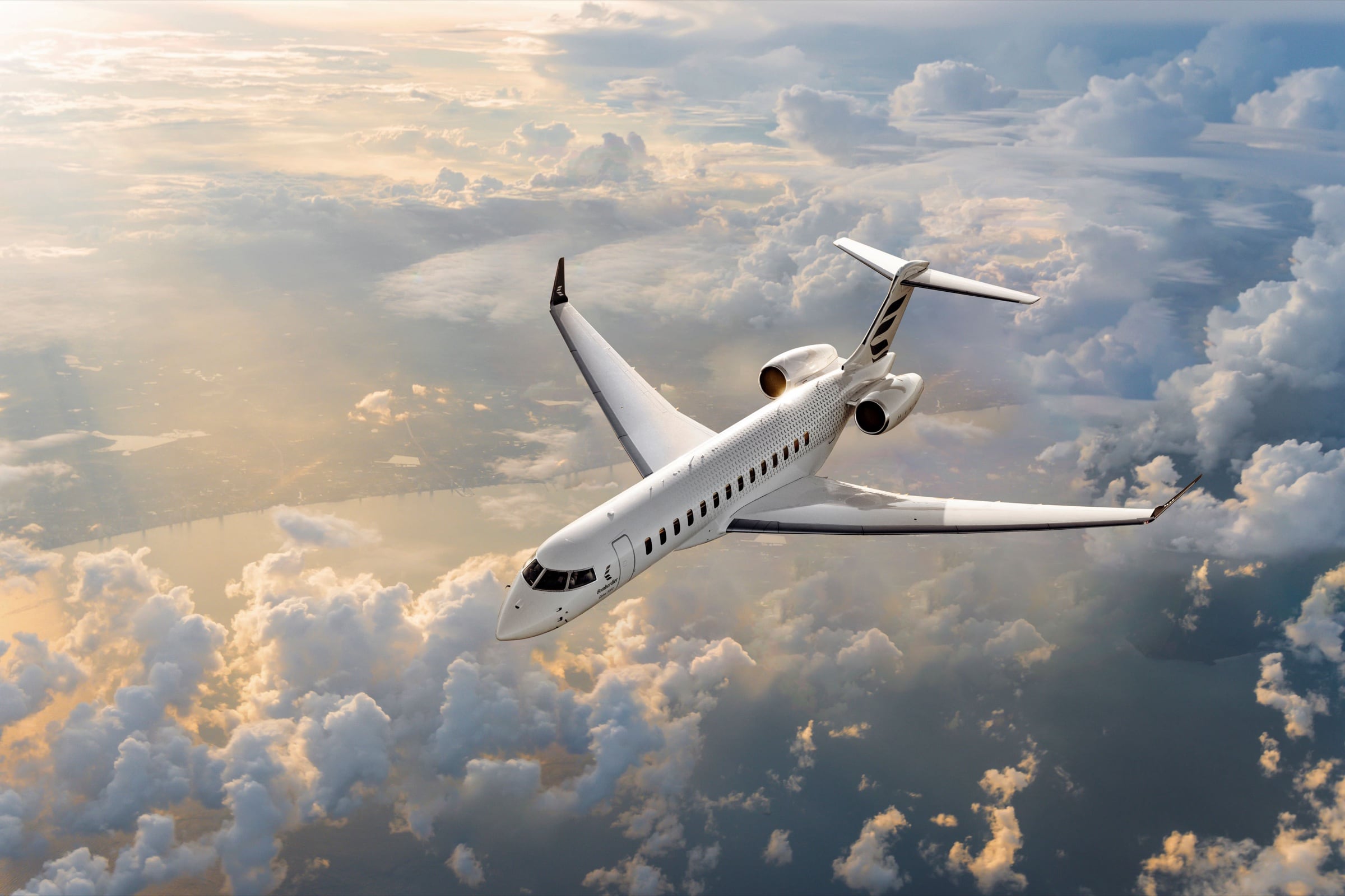 The Bombardier Global 8000 banking over a golden evening cloudscape