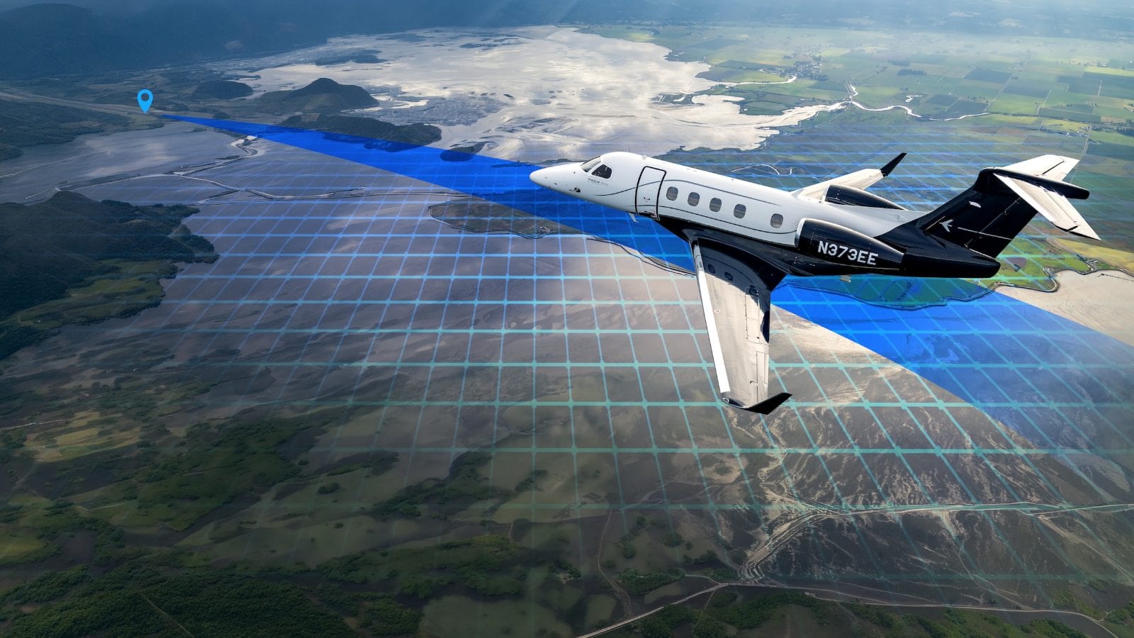 Embraer's visualisation of Garmin Emergency Autoland — a Phenom 300EV tracking a projected guidance path toward a runway below
