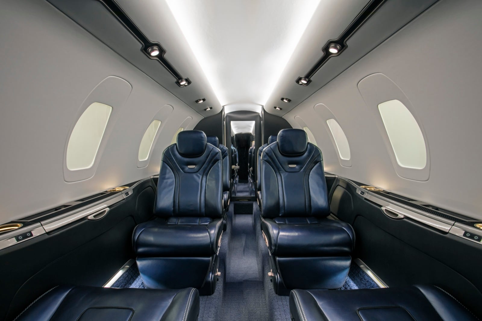 The 560XL cabin, shown in current XLS Gen2 trim - club seating beneath a stand-up centre aisle