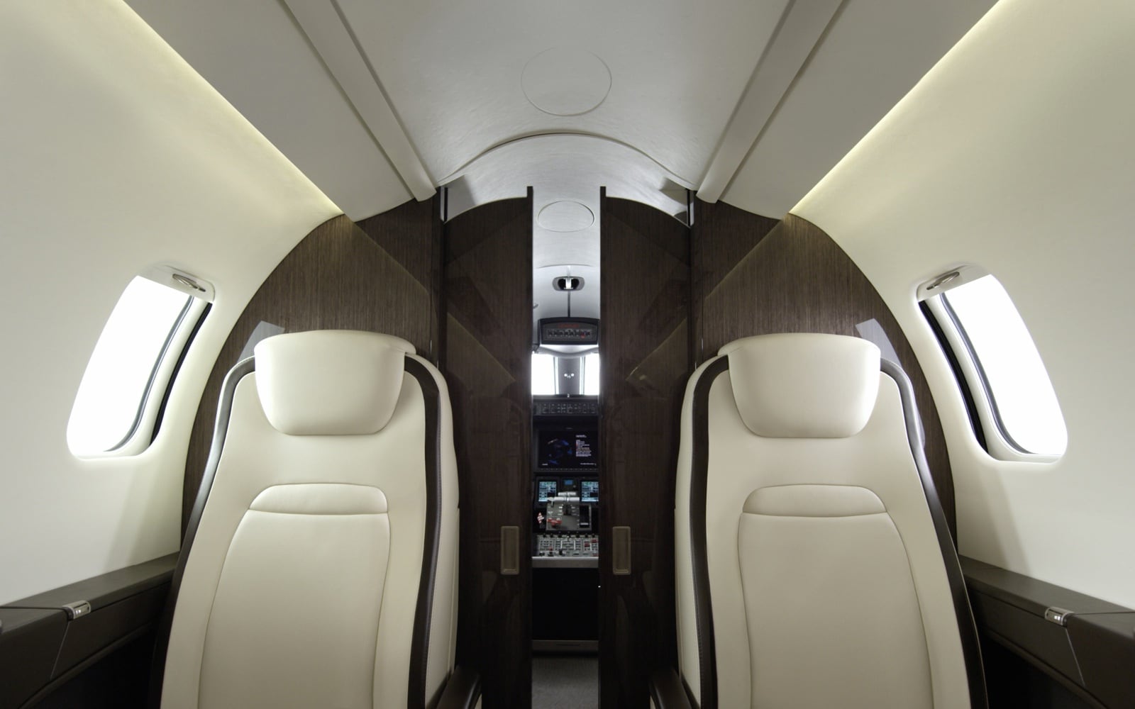The Learjet 75 forward cabin with pocket doors - Bombardier’s official interior imagery