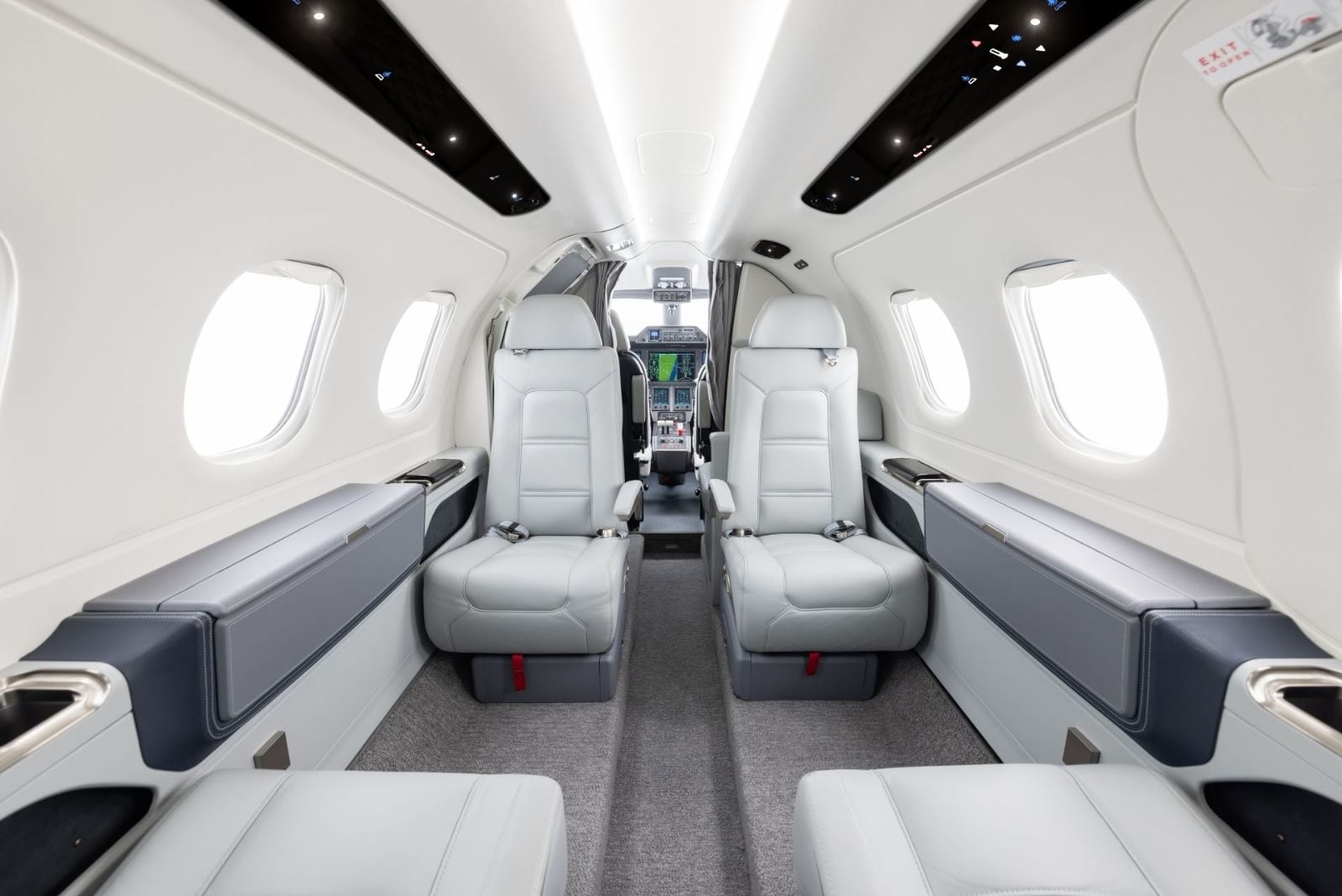 The Phenom 100 cabin — a club four in the class's roomiest cross-section