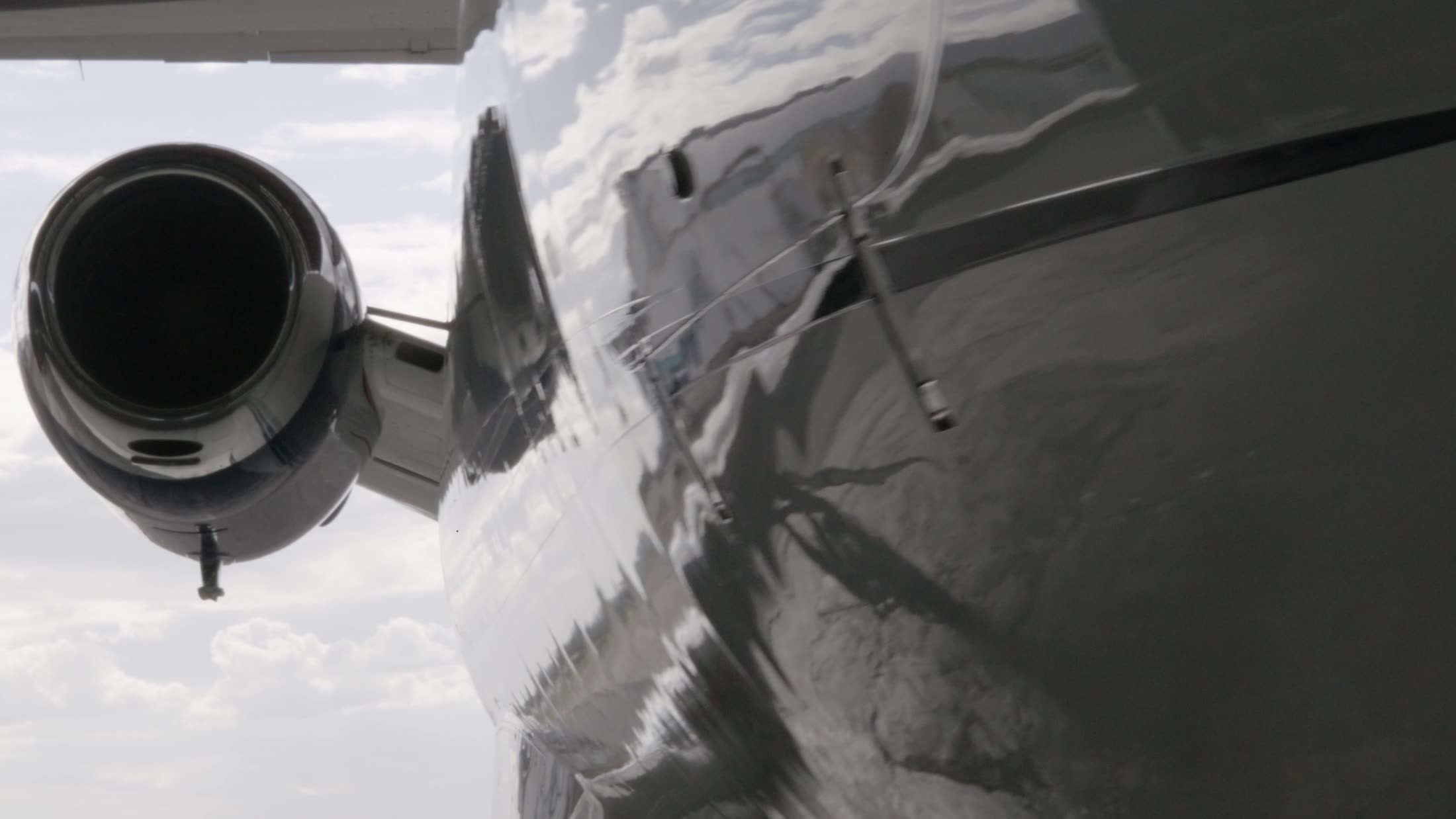 A jet wing above the clouds